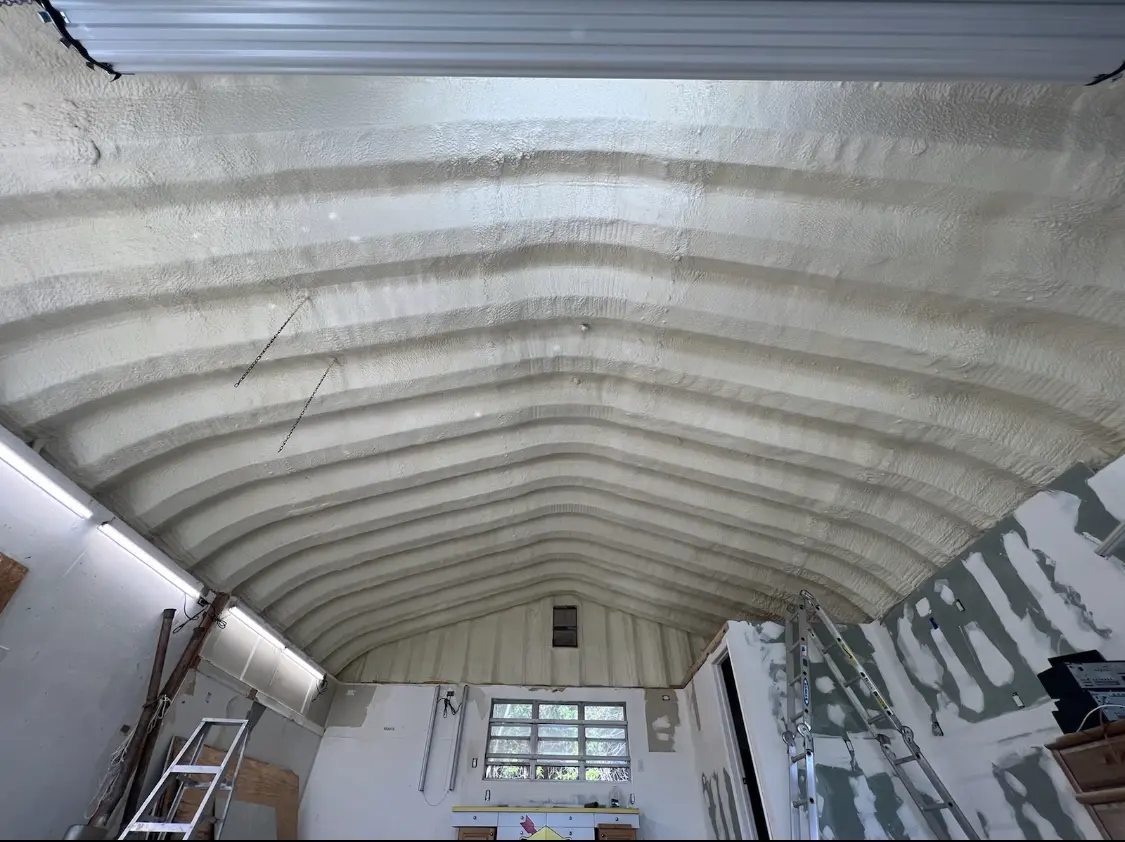 Spray polyurethane foam applied to the underside of a metal roof deck in Sudbury